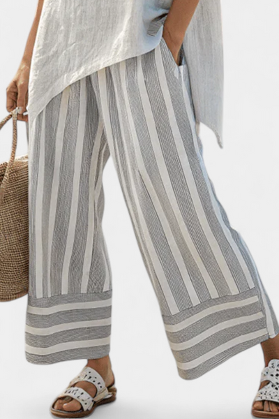 Alina | Completo blusa asimmetrica e pantaloni a righe